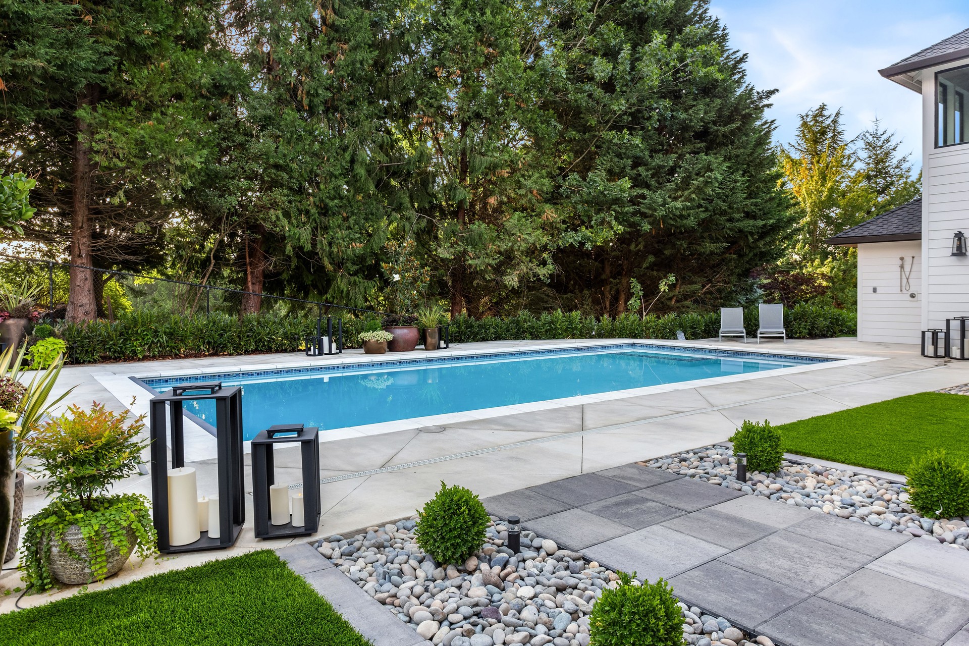 Swimming pool in backyard exterior of extraordinary luxury home